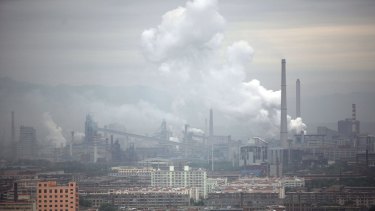 A coal-fired power plant spews emissions in Taiyuan, China.