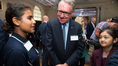 David Gonski with students Adalyah Swann (left) and Hannah Sivas in the NSW State Library. 