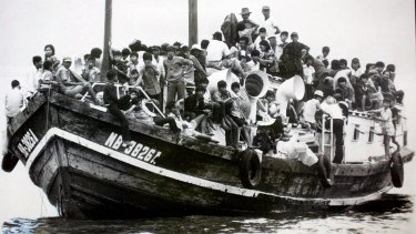 A group of Vietnamese boat people arriving in Australia.