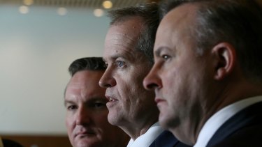 Shadow treasurer Chris Bowen, Opposition Leader Bill Shorten and shadow infrastructure and transport minister Anthony Albanese announce the change in Labor's policy on petrol excise.