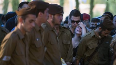 Family and friends at the funeral of of Israeli soldier Daniel Pomerantz, who was killed during fighting in Gaza.