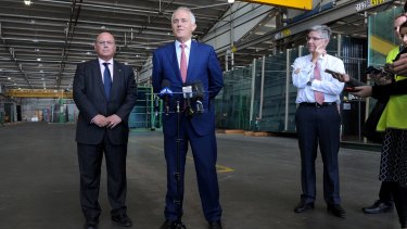 Prime Minister Malcolm Turnbull speaks to the media after a visit to the CSR Viridia Glass factory in Dandenong.