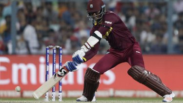 Marlon Samuels in full flight for the West Indies.