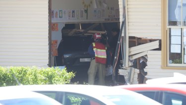 Two boys were killed and three girls seriously injured after a car smashed into a primary school classroom in Greenacre.