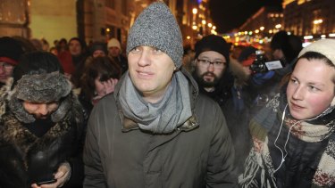 Putin critic Alexei Navalny arrested at rally after suspended sentence in fraud case