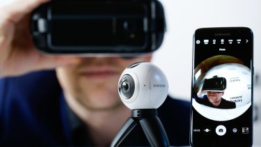 A Samsung Gear 360 camera watches an employee watching himself in VR.