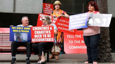 Supporters of victims who went through the Parramatta Girls Training School and the Institution for Girls in Hay protest outside the royal commission in February.