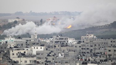 Smoke and flames are seen during Israeli offensive in the east of Gaza City.
