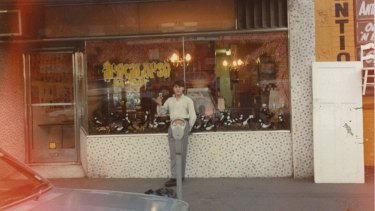 Sometime on the 'late afternoon' of April 24, 1986 having just received the keys and with champagne in hand, Mario Maccarone stands outside what is now Marios. 