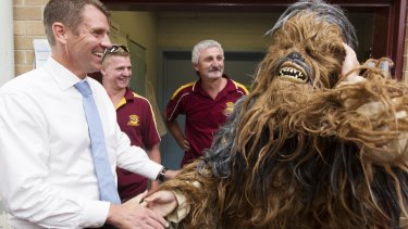 Chewie?: Mike Baird meets a yowie mascot at Queanbeyan Basketball Centre.