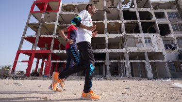 Nader al-Masri on a training run in the Gaza Strip town of Beit Hanoun.