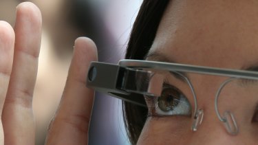 Through the looking glass: An attendee tries Google Glass during a Google developer conference earlier this year.