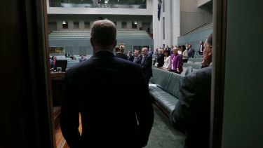 Speaker Tony Smith enters the House of Representatives. He and the Senate President, Tasmanian Stephen Parry, jointly administer a budget of around $300 million a year to run the giant Parliament House.