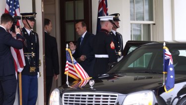 Prime Minister Tony Abbott arrives at the White House to meet the President of the United States, Barack Obama, in the Oval Office last year. 