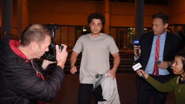 Daniel Ibrahim, also known as Daniel Taylor, the son of Kings Cross nightclub owner John Ibrahim, leaves the Sydney Police Centre after posting bail. 