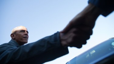 Done deal? President Barack Obama shakes hands in Alaska.