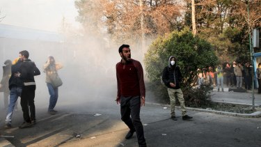 Students protest inside Tehran University on December 30.