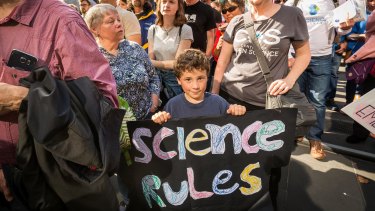 Young Einstein  Lachlan, 7, joins the thousands at Melbourne's March For Science.