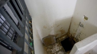 The shower area where authorities say drug lord Guzman, slipped into a tunnel to escape from the Altiplano maximum security prison in July 2015.