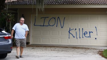 Walter Zalisko, a private investigator for the Palmer family, outside the home following a vandalism attack. 