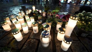 Memorial candles at the Market Square for the victims of Friday's stabbings in Turku, Finland.