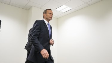 Mr Abbott, at the AFP headquarters in Melbourne, says he's "very confident" he'll remain PM.