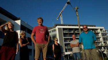 Residents of Zetland, standing near Mary O'Brien Park, are unhappy about the increased traffic in their streets due to the Green Square development.