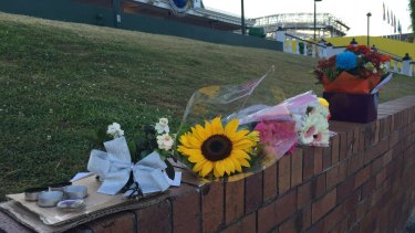 Flowers left in tribute for the four people killed at Dreamworld.