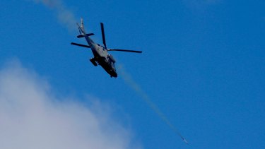 A helicopter gunship fires a rocket at Islamist militant positions in Marawi, a provincial capital on the southern Philippine island of Mindanao.