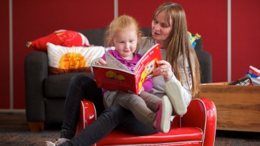 Helping: Lynne Trenerry reads to her four-year-old granddaughter. Research shows children love being read to but parents end the practice once children learn to read. 
