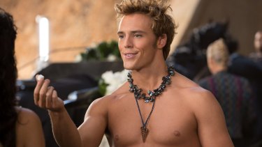 Sam Claflin as Finnick Odair in The Hunger Games movie Catching Fire.
