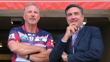 Rebel with a cause: Melbourne Rebels owner Andrew Cox (right) with England cricket great Ian Botham.