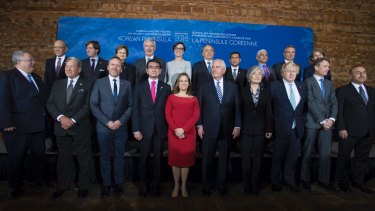 Foreign ministers meet in Vancouver with Canadian Minister of Foreign Affairs Chrystia Freeland, centre, and US Secretary of State Rex Tillerson on her right.