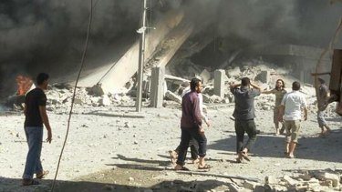 The aftermath of a strike in Talbiseh on September 30.