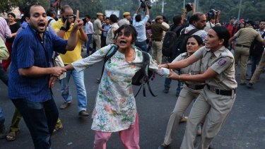 Indian police in Delhi attempt to stop 'Kiss of Love' protesters from marching on the headquarters of the RSS, a Hindu nationalist organisation linked to India's ruling Bharatiya Janata Party.