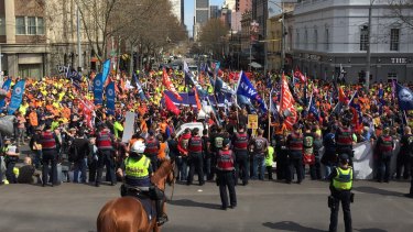 Thosands of workers rally in Melbourne's CBD to show their support for sacked CUB workers