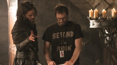Travis Fimmel (left) and director Duncan Jones on the set of <i> Warcraft</I>.