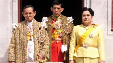 King Bhumibol Adulyadej, Crown Prince Maha Vajiralongkorn and Queen Sirikit in 1999.