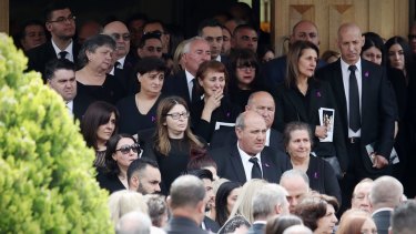A thousand sombre mourners gathered to pay their respects to Tony Sergi.