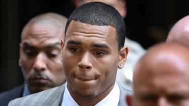 Chris Brown leaves court in 2009 after facing assault charges against former girlfriend Rihanna. 