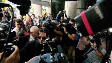 Johnny Depp and Amber Heard receive attention outside court.