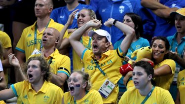 United: members of the Australian swim team cheer Mack Horton during the 400m final in Rio.