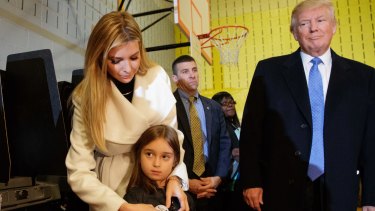 Ivanka with her daughter Arabella and father Donald.