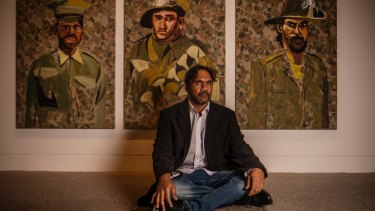 Vincent Namatjira, at Hazelhurst Arts Centre with part of his new work for the exhibition.