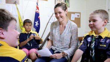 Dr Jess Baker, with kids in a focus group on dementia