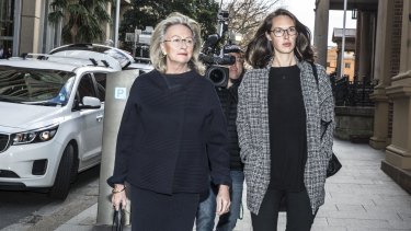 Jill Wran arrives at court with a family friend for the trail of her daughter Harriet Wran who is facing the charge of murder.