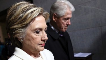 Facing up to failure: Hillary Clinton and her husband Bill arrive for the inauguration of US President Donald Trump in January.