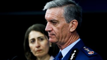 NSW Premier Gladys Berejiklian and NSW Police Commissioner Andrew Scipione at a press conference on February 2, during which he announced his retirement.
