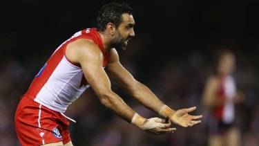 At the receiving end again: Adam Goodes gestures to a teammate during the game.