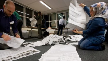 Ballot papers are sorted and hand counted at the mayor's office in The Hague on Wednesday.